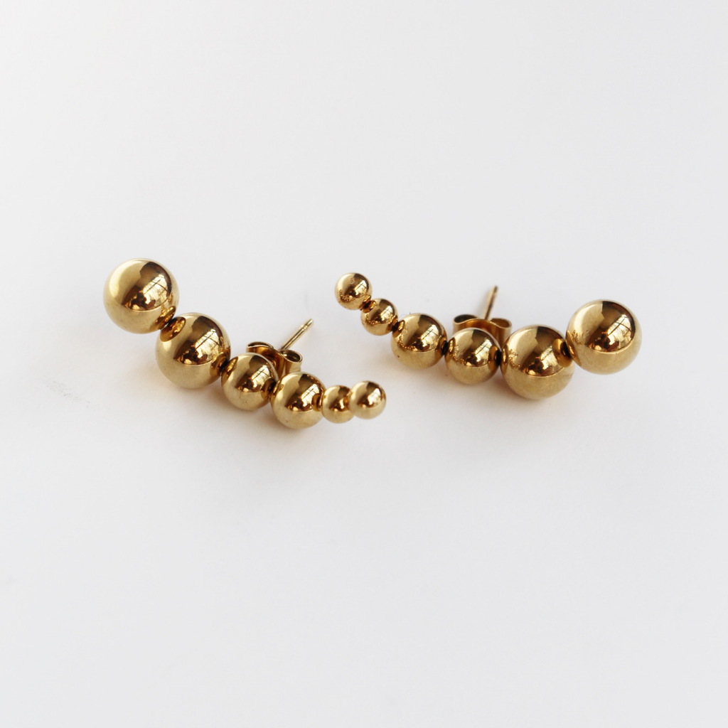 Aretes María